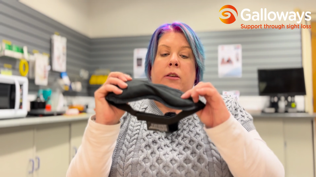 An image of Jenny holding a heated eye mask.
