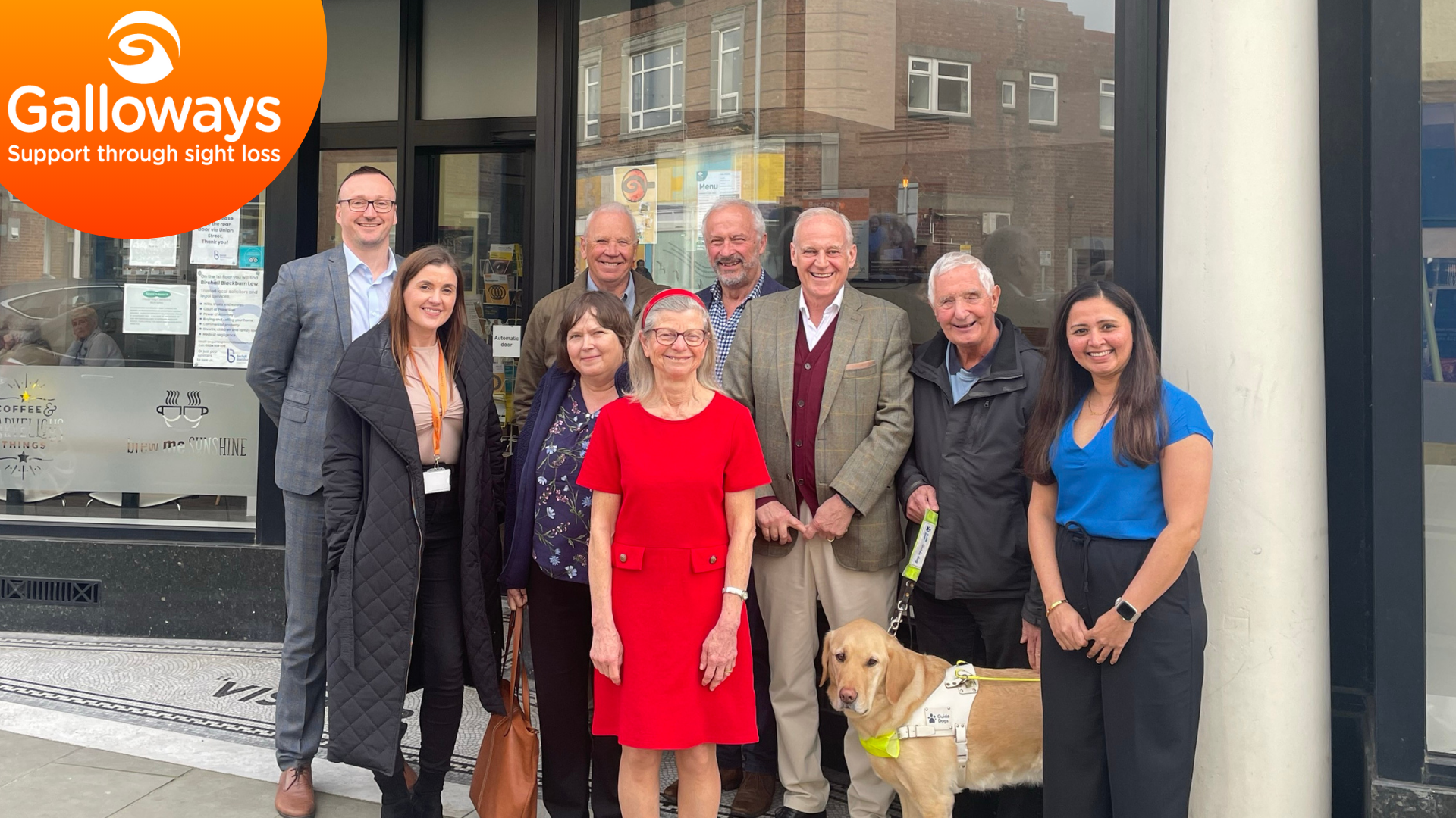 Image of a few members of our board of trustees stood outside of our Morecambe Cafe.