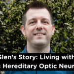 Image of Glen stood in front of a leafy shrub with the title "Glen's Story: Living with Leber's Hereditary Optic Neuropathy'
