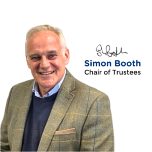 Portrait of Simon Booth, Chair of Trustees at Galloways, smiling at the camera, with his signature and name displayed beside him.